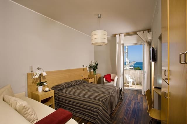 Triple Room, 1 Queen Bed with Sofa bed