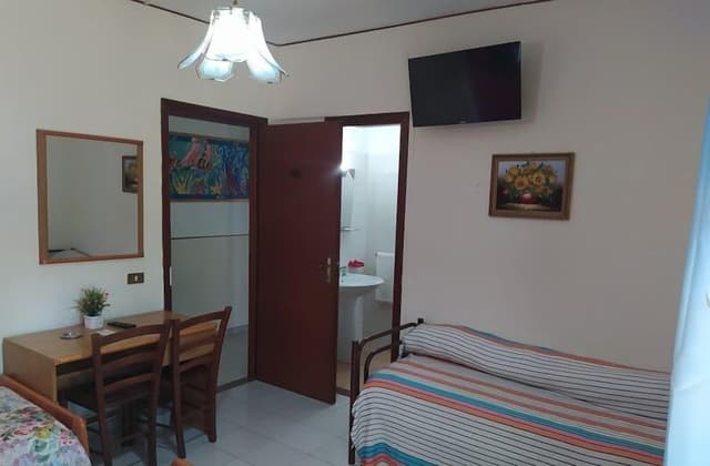 Double Room (with 2 extra beds)