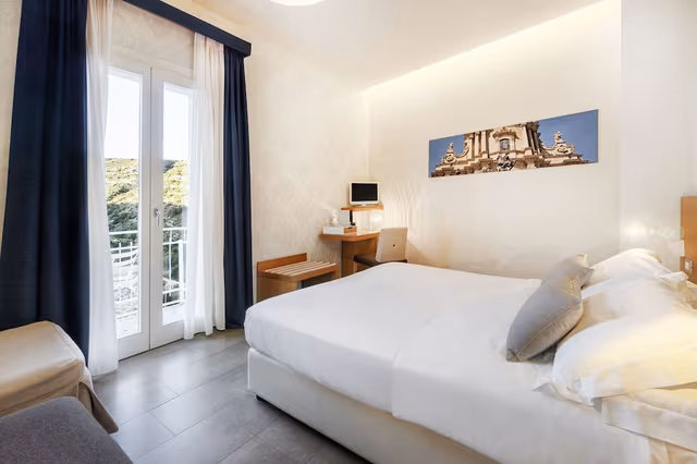 Deluxe room with double bed or 2 single beds with balcony