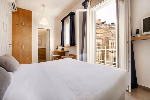 Deluxe room with double bed or 2 single beds with balcony