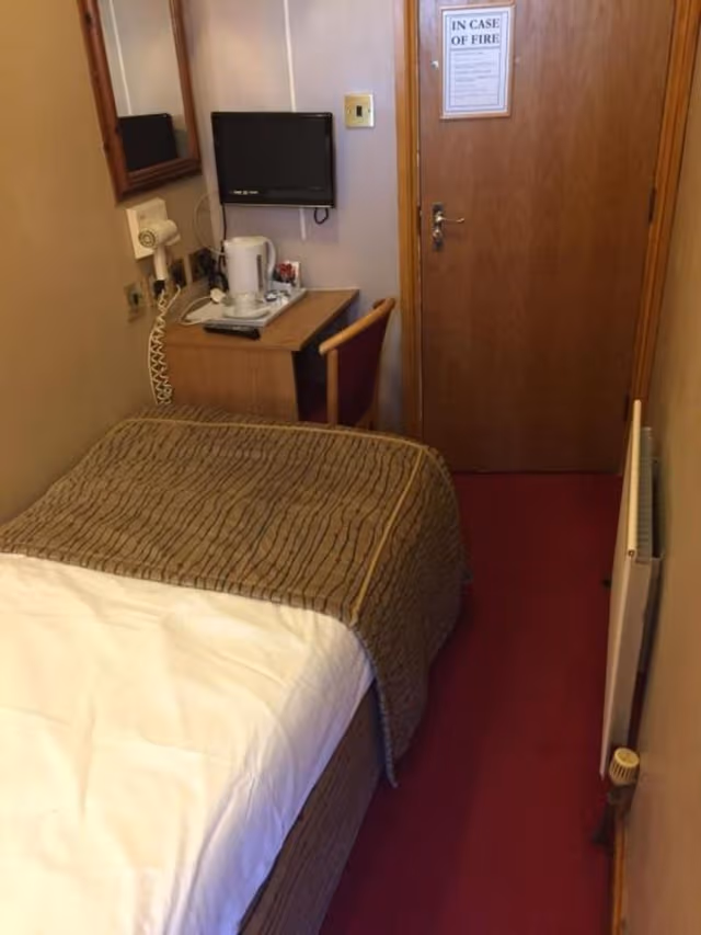 Basic Single Room, 1 Twin Bed, Shared Bathroom