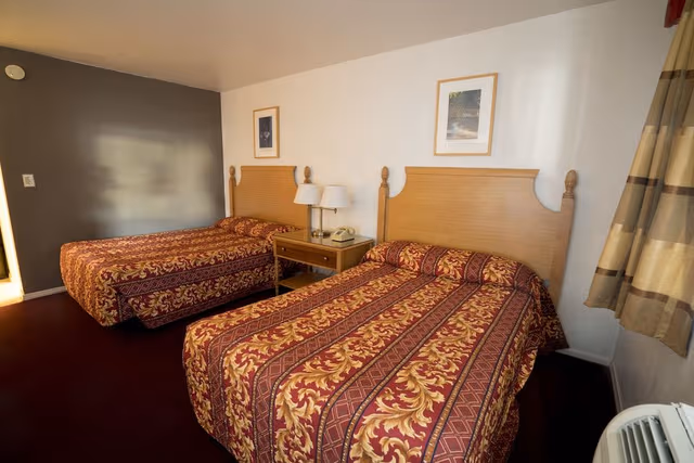 Two Double Beds with 7 Days Parking