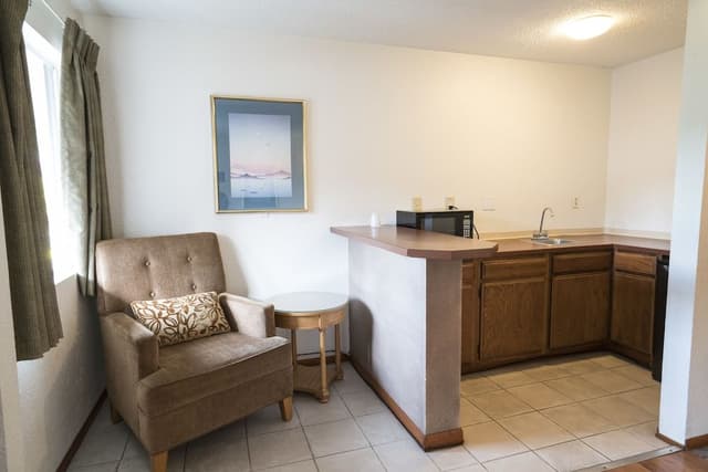 One Queen Bed with 7 Days Parking
