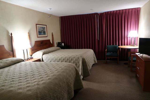 Deluxe Room, 2 Queen Beds. Pet Availability Limited. Please inform of pets at time of booking.