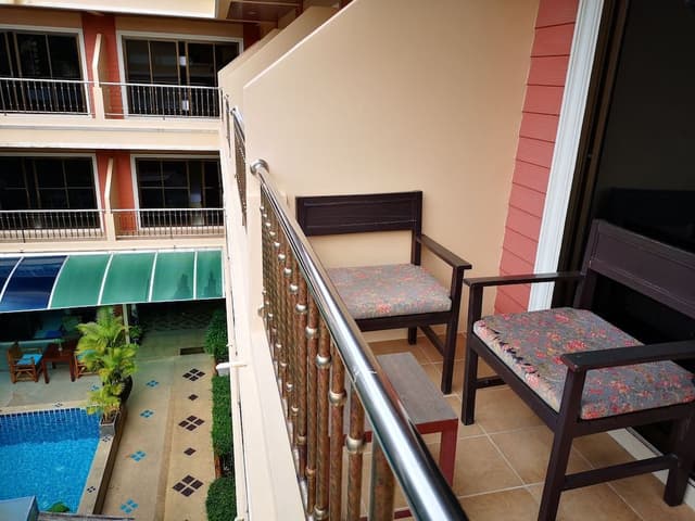 Deluxe Top Floor with Balcony & Pool View