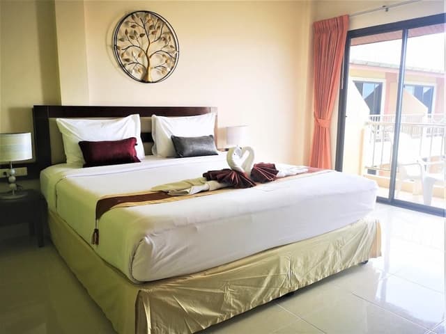 Deluxe Top Floor with Balcony & Pool View