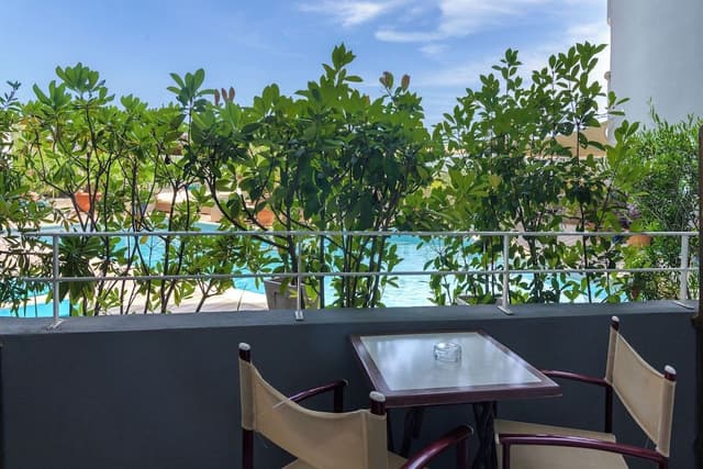 Double or Twin Room, Balcony, Pool View (1st Floor)