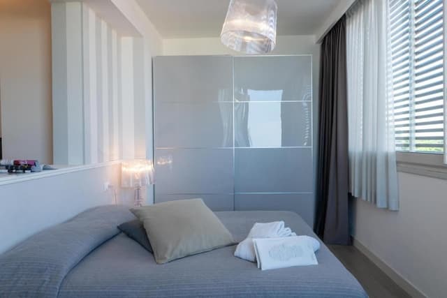 Junior Suite with Side Sea View