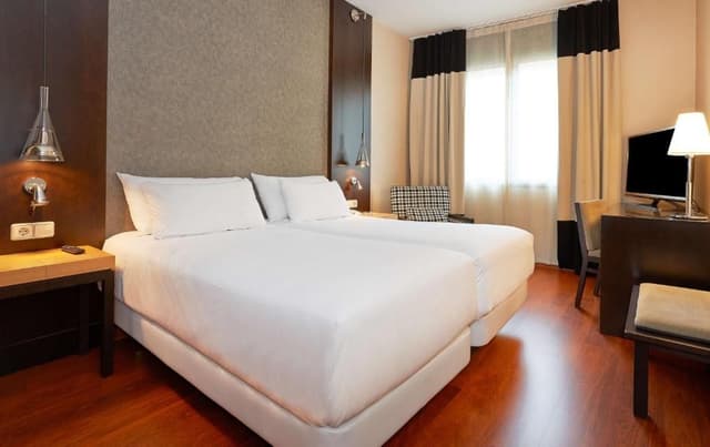 Family Adjoining Room (2 Adults + 2 Children)