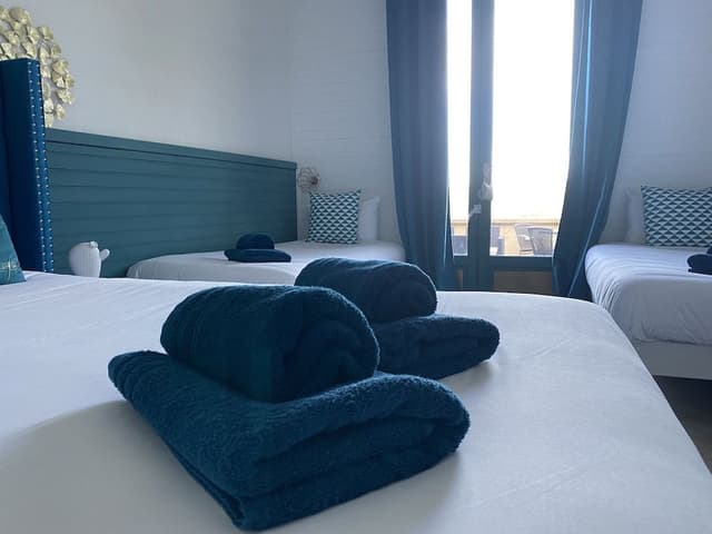 Chambre Triple Confort Terrasse Climatisée
