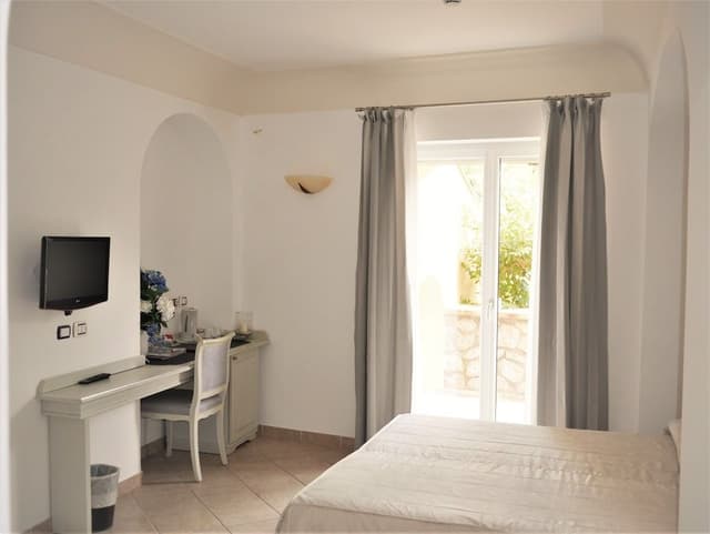 Standard Double Room, Balcony, Garden View