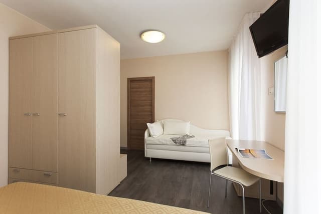 Family Quadruple Room, 1 Bedroom, Balcony, Partial Sea View