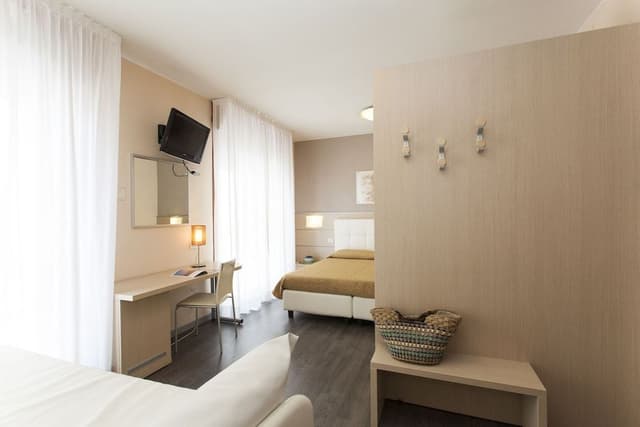 Family Quadruple Room, 1 Bedroom, Balcony, Partial Sea View