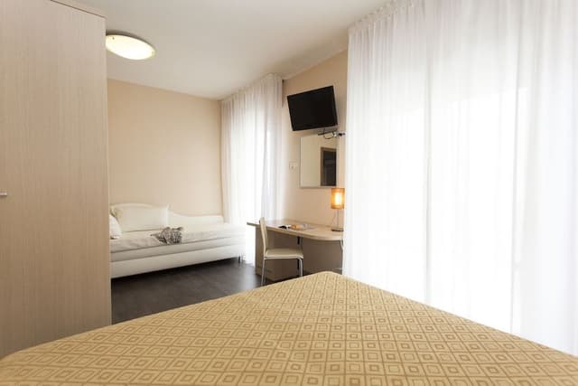 Family Quadruple Room, 1 Bedroom, Balcony, Partial Sea View
