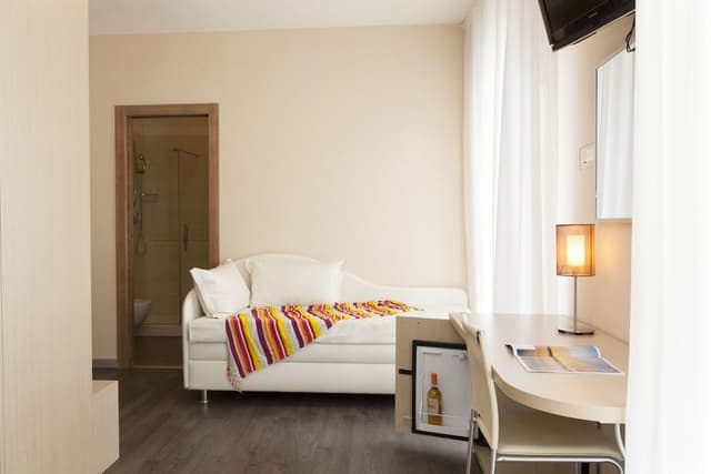 Family Quadruple Room, 1 Bedroom, Balcony, Partial Sea View