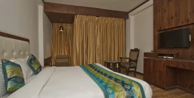 Premium Room (With Private Balcony and Normal View of Mountains)