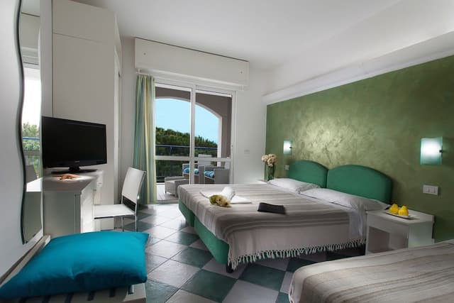 Superior Quadruple Room, Balcony, Beach View
