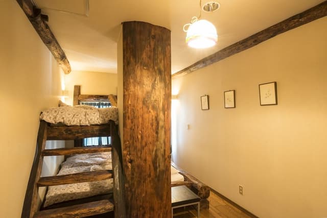 Woody Triple Log Bed with Shared Bathroom