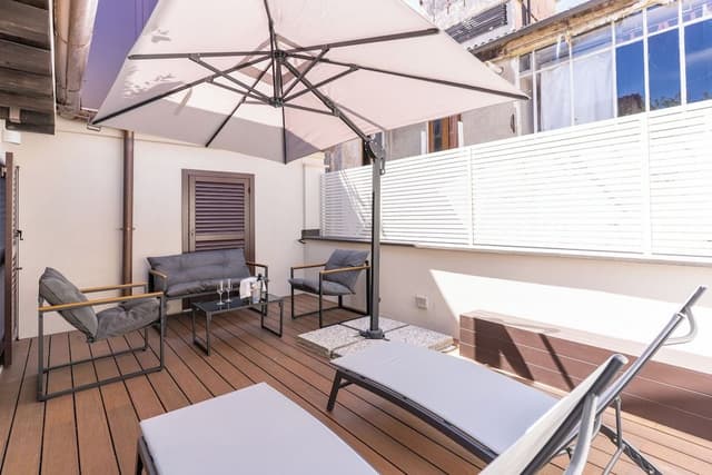 Quadruple room with private terrace on the fifth floor in the separate building