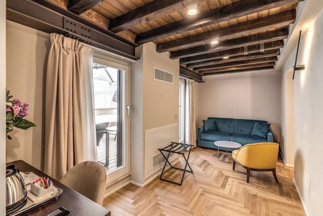 Quadruple room with private terrace on the fifth floor in the separate building