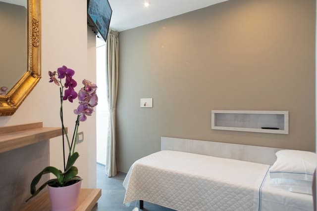 Basic Single Room, 1 Twin Bed, Partial Sea View, Garden Area