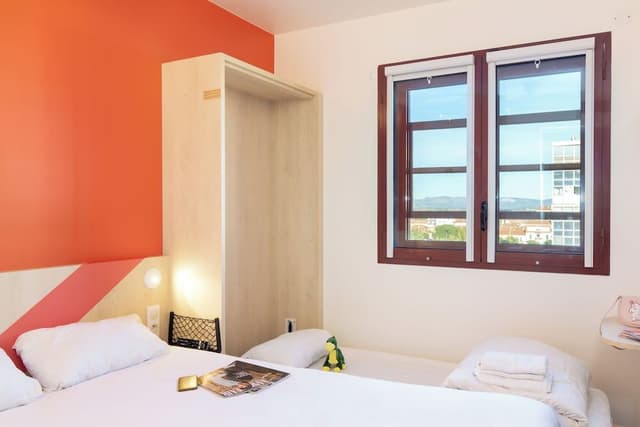 Triple Room (1 Double Bed and 1 Twin Murphy Bed)