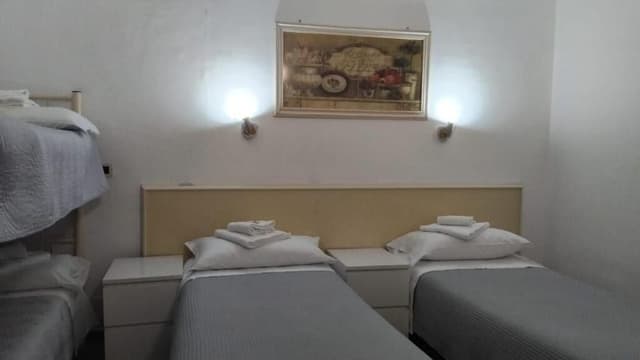 Economy Quadruple Room, Courtyard View