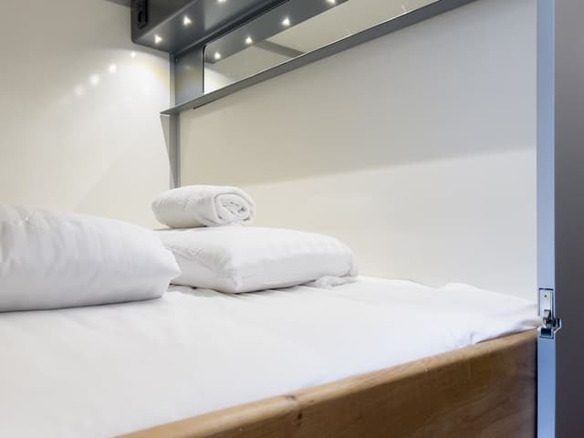 Private capsule with double bed