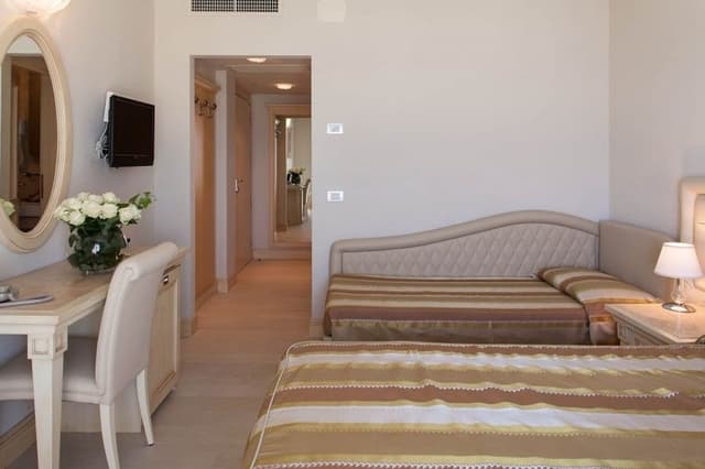 Superior Large con Balcone Vista Mare