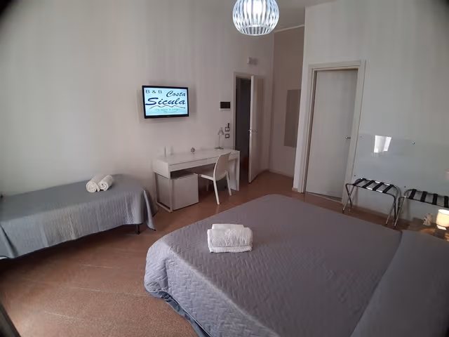 Deluxe Triple Room