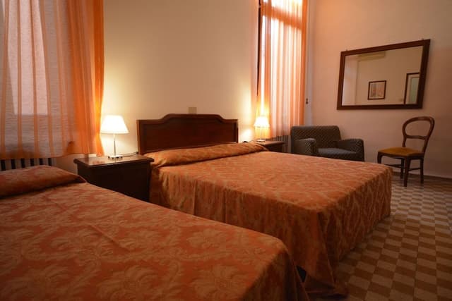 Triple Room (private shower - shared bathroom )