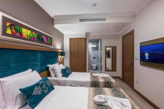 Deluxe Triple Room