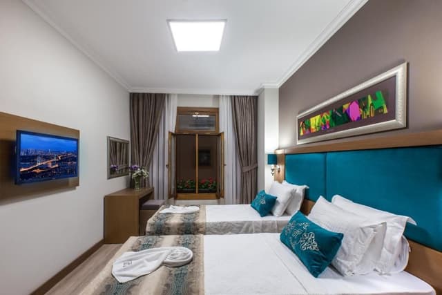 Deluxe Triple Room