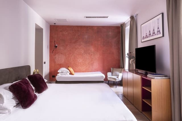 Camera Matrimoniale con letto aggiunto