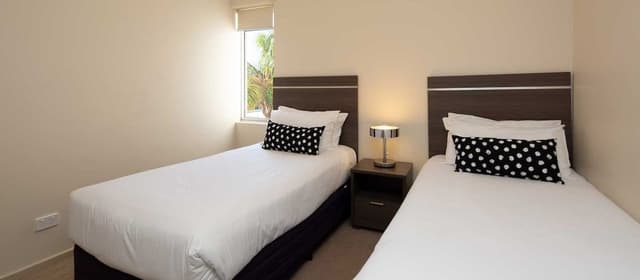 2 Bedroom 1 Queen & 2 Singles Deluxe