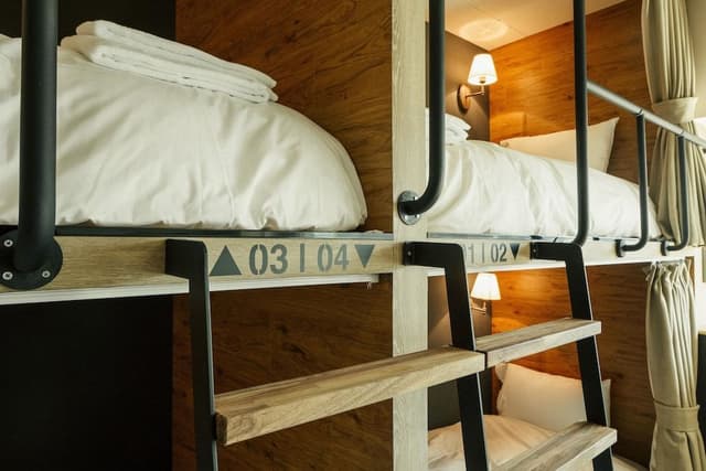 Six beds with shared bathroom