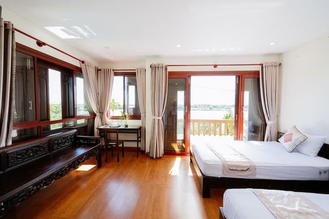 Deluxe Family Room with Balcony and River View
