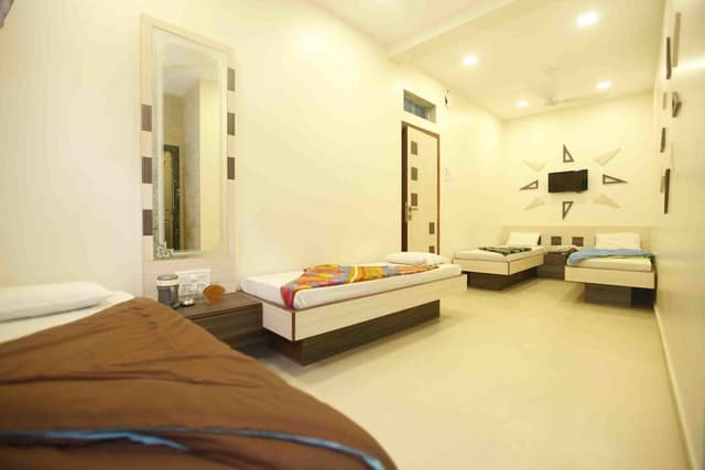 Deluxe Quadruple Room, Multiple Beds, Private Bathroom, City View