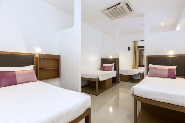Deluxe Quadruple Suite (4 Adults and 2 Children under 6 years old sleeping for free in existing bed)