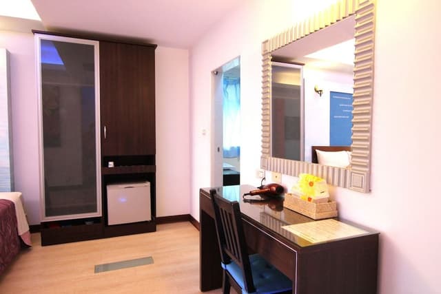 Deluxe Quadruple Room, 2 Queen Beds, Balcony, Sea View