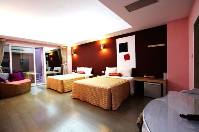 Deluxe Quadruple Room, 2 Queen Beds, Balcony, Sea View