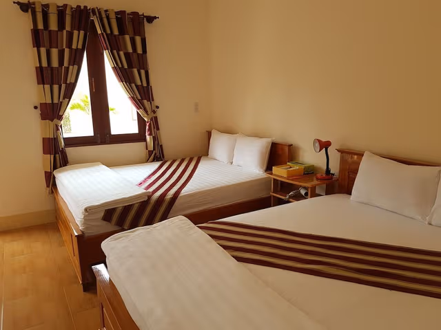 Deluxe Quadruple Room, 2 Queen Beds, Non Smoking, Garden View
