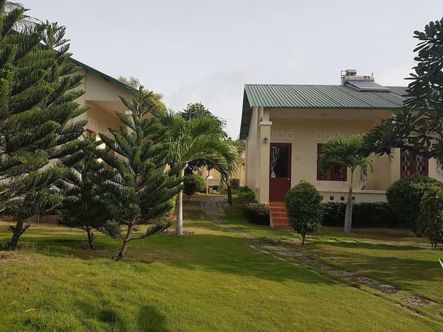 Deluxe Quadruple Room, 2 Queen Beds, Non Smoking, Garden View
