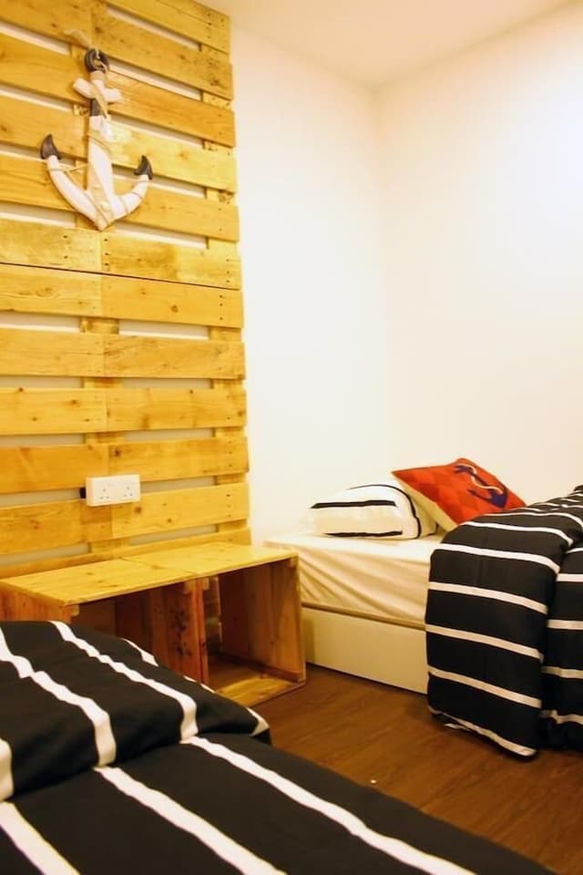 Private Twin Bed With Shared Bathroom