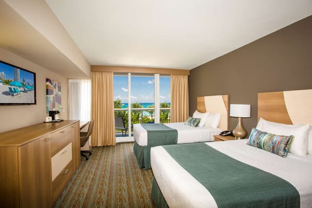 2 Double Beds, Non-Smoking, Ocean Front, Balcony, Flat Screen Television, High Speed Internet Access, Hairdryer