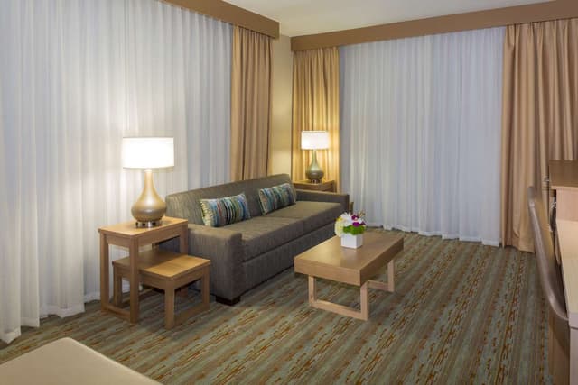 Suite-2 Double Beds, Non-Smoking, Executive Room, Separate Living Area, Balcony, Microwave And Refrigerator, High Speed Internet Access