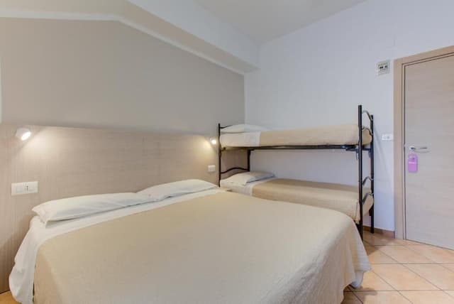 Economy Quadruple Room, Balcony