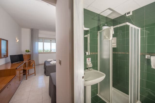 Quadruple Room (2 adults + 2 children)