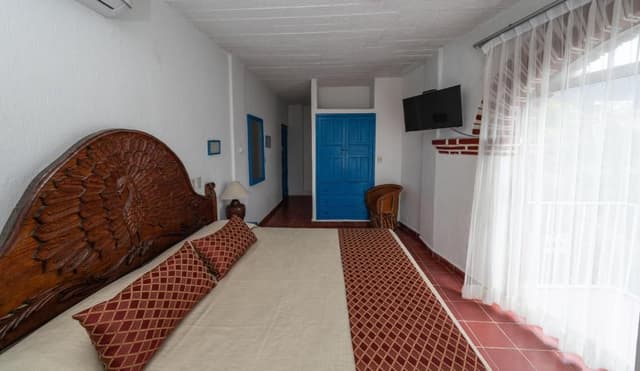 Superior con balcón vista a la ciudad