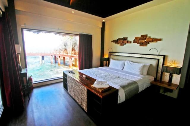 Water Villa with Free Roundtrip Lio Airport Transfers